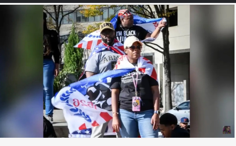 Community parade with 1526 flags honoring Foundational Black Americans